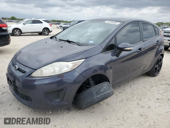 2013 Ford Fiesta SE with VIN 3FADP4EJ6DM165145, listed as a Copart auction lot 50395685 with 71,505 mi miles and Salvage Title. Bid and sale history available at DreamBid. Image 1.