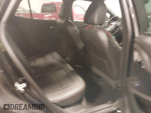 2024 Chevrolet Trax 2RS with VIN KL77LJE23RC010648, listed as a IAAI auction lot 41883737 with 30,141 mi miles and . Bid and sale history available at DreamBid. Image 8.