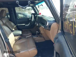 2012 Jeep Wrangler Unlimited Altitude z VIN 1C4HJWEG7CL191444, wystawiony jako IAAI lot #41643441 z przebiegiem 220 785 mil mil oraz . Historia ofert i sprzedaży dostępna na DreamBid. Obrazek 5.