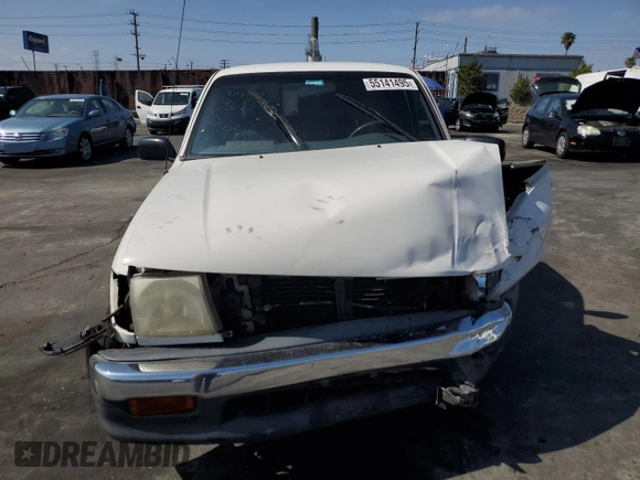 1999 Toyota Tacoma z VIN 4TAVL52N7XZ567598, wystawiony jako Copart lot #55141495 z przebiegiem 225 505 mil mil oraz Szkoda całkowita • Salvage title. Historia ofert i sprzedaży dostępna na DreamBid. Obrazek 5.