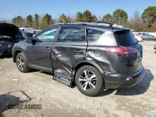 2018 Toyota RAV4 XLE with VIN 2T3RFREV3JW848384, listed as a Copart auction lot 88758945 with 28,951 mi miles and Salvage Title. Bid and sale history available at DreamBid. Image 2.