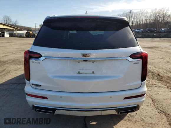 2022 Cadillac XT6 Premium Luxury z VIN 1GYKPDRS9NZ113152, wystawiony jako Copart lot #49411355 z przebiegiem 32 948 mil mil oraz Szkoda całkowita • Salvage title. Historia ofert i sprzedaży dostępna na DreamBid. Obrazek 6.