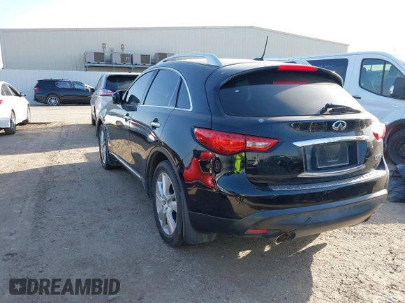 2014 Infiniti QX70 with VIN JN8CS1MU5EM450712, listed as a IAAI auction lot 41734354 with 164,349 mi miles and . Bid and sale history available at DreamBid. Image 3.