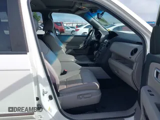 2013 Honda Pilot Touring z VIN 5FNYF4H99DB017351, wystawiony jako IAAI lot #42355167 z przebiegiem 122 191 mil mil oraz . Historia ofert i sprzedaży dostępna na DreamBid. Obrazek 5.
