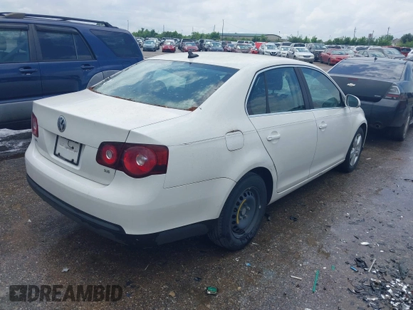 2009 Volkswagen Jetta Sedan SE with VIN 3VWRM71K19M076953, listed as a IAAI auction lot 42110365 with 182,208 mi miles. Bid and sale history available at carsss.com. Image 4.