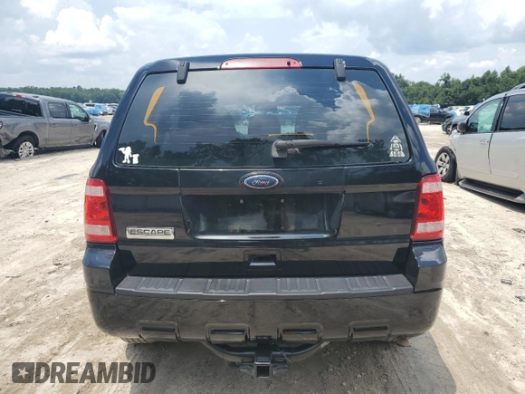 2010 Ford Escape XLS with VIN 1FMCU0C71AKC97243, listed as a Copart auction lot 63966335 with 156,065 mi miles and Non repairable. Bid and sale history available at DreamBid. Image 6.
