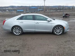 2016 Cadillac XTS Luxury Collection with VIN 2G61N5S32G9100730, listed as a IAAI auction lot 41672868 with 62,882 mi miles and . Bid and sale history available at DreamBid. Image 13.