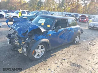 2007 MINI Cooper Hardtop with VIN WMWMF33537TU60042, listed as a IAAI auction lot 40851341 with 219411 miles. Bid and sale history available at carsss.com. Image 19.