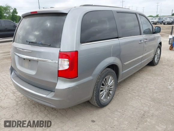2013 Chrysler Town & Country Touring L with VIN 2C4RC1CG7DR779762, listed as a IAAI auction lot 42118866 with 151,833 mi miles and . Bid and sale history available at DreamBid. Image 4.