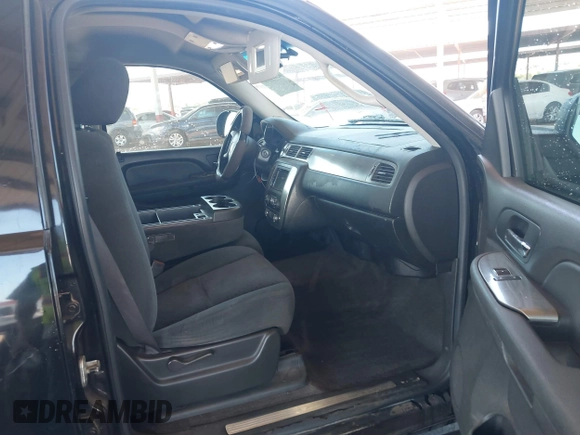 2007 Chevrolet Tahoe LS with VIN 1GNFC13C07J400472, listed as a IAAI auction lot 42209311 with 212,924 mi miles and . Bid and sale history available at DreamBid. Image 5.