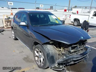 2014 BMW X1 xDrive28i with VIN WBAVL1C57EVY23722, listed as a IAAI auction lot 41839543 with 121,742 mi miles. Bid and sale history available at carsss.com. Image 1.