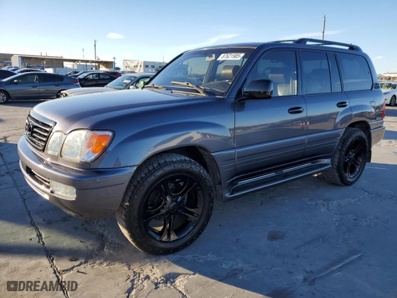 2006 Lexus LX 470 with VIN JTJHT00W564016353, listed as a Copart auction lot 87621905 with 184,862 mi miles and Salvage Title. Bid and sale history available at carsss.com. Image 1.
