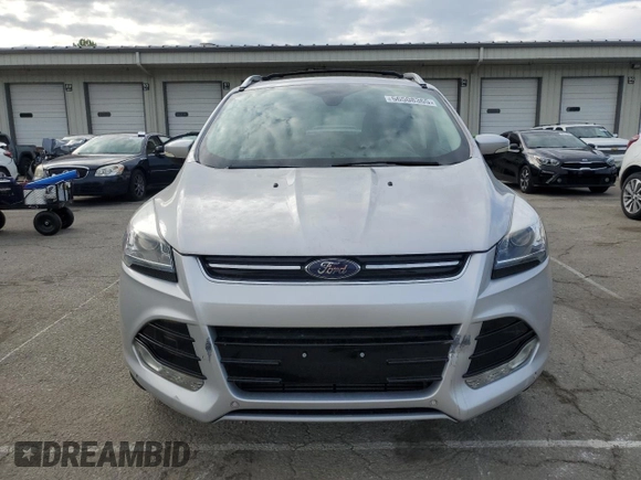 2015 Ford Escape Titanium с VIN 1FMCU9J99FUC33052, выставлен на аукционе Copart как лот 56508365 с пробегом Не указан миль и На запчасти • Non repairable. История ставок и продаж доступна на DreamBid. Изображение 5.