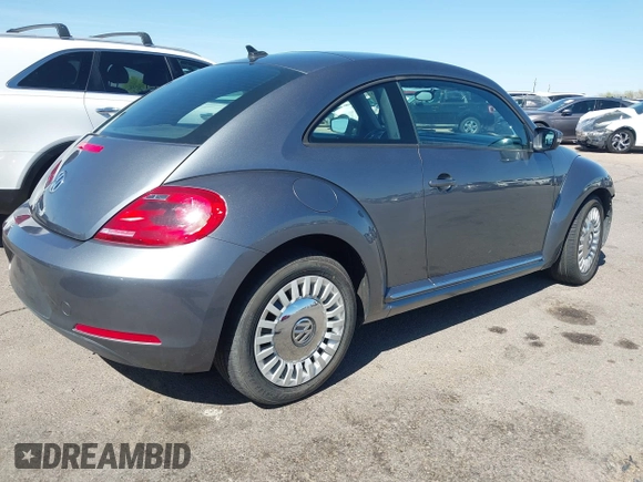 2014 Volkswagen Beetle 1.8T z VIN 3VWJ17AT9EM664866, wystawiony jako IAAI lot #42157223 z przebiegiem 36 381 mil mil oraz . Historia ofert i sprzedaży dostępna na DreamBid. Obrazek 4.
