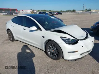 2023 Tesla Model 3 z VIN 5YJ3E1EA5PF575762, wystawiony jako IAAI lot #40701024 z przebiegiem 25 170 mil mil oraz . Historia ofert i sprzedaży dostępna na DreamBid. Obrazek 1.
