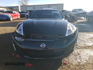 2014 Nissan 370Z Nismo z VIN JN1AZ4EHXEM632166, wystawiony jako Copart lot #88311915 z przebiegiem 18 414 mil mil oraz Szkoda całkowita • Salvage title. Historia ofert i sprzedaży dostępna na DreamBid. Obrazek 5.