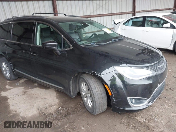 2018 Chrysler Pacifica Touring L z VIN 2C4RC1BG8JR211405, wystawiony jako IAAI lot #42301088 z przebiegiem 92 876 mil mil oraz . Historia ofert i sprzedaży dostępna na DreamBid. Obrazek 1.