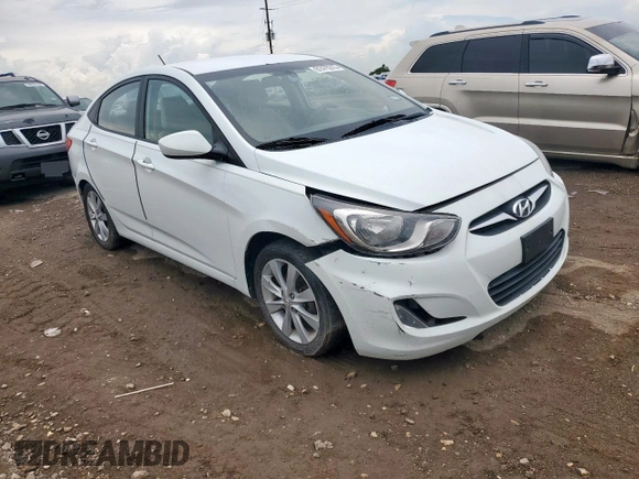 2012 Hyundai Accent GLS with VIN KMHCU4AEXCU069242, listed as a Copart auction lot 61475315 with 136,591 mi miles and Salvage title. Bid and sale history available at DreamBid. Image 4.