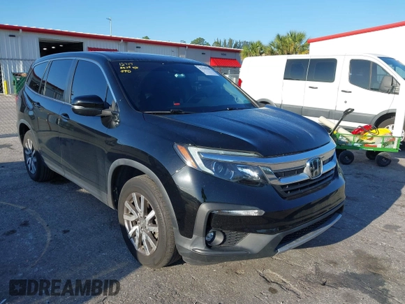 2021 Honda Pilot EX-L with VIN 5FNYF5H55MB044677, listed as a IAAI auction lot 42038704 with 38,684 mi miles and . Bid and sale history available at carsss.com. Image 12.