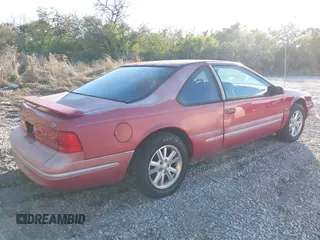 1997 Ford Thunderbird LX with VIN 1FALP62W8VH150725, listed as a IAAI auction lot 41549743 with 106,211 mi miles and . Bid and sale history available at DreamBid. Image 4.