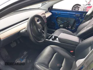 2020 Tesla Model 3 Standard Range Plus z VIN 5YJ3E1EA8LF785010, wystawiony jako IAAI lot #42130951 z przebiegiem 90 072 mil mil oraz . Historia ofert i sprzedaży dostępna na DreamBid. Obrazek 5.