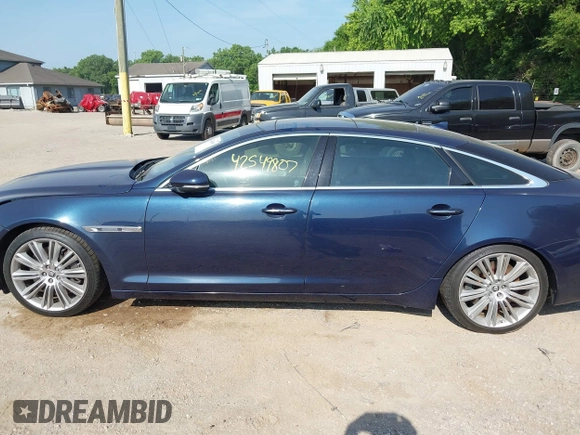 2013 Jaguar XJ Supercharged with VIN SAJWA2GE8DMV43164, listed as a IAAI auction lot 42549807 with 59,744 mi miles and . Bid and sale history available at DreamBid. Image 14.