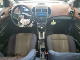 2012 Chevrolet Sonic LT with VIN 1G1JC5SH3C4192144, listed as a Copart auction lot 60973395 with 141,306 mi miles and Salvage title. Bid and sale history available at DreamBid. Image 8.