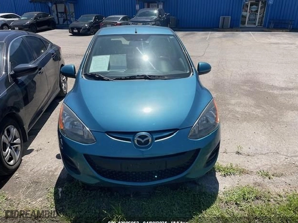 2011 Mazda Mazda2 Sport with VIN JM1DE1HY7B0116561, listed as a IAAI auction lot 42006952 with 139,369 mi miles. Bid and sale history available at carsss.com. Image 11.
