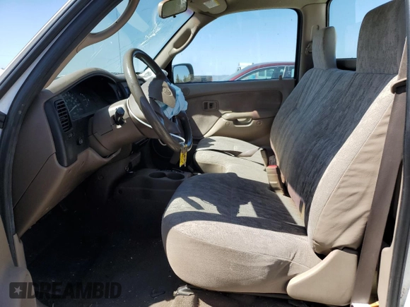 2002 Toyota Tacoma with VIN 5TENL42N22Z097170, listed as a Copart auction lot 58804945 with 103,290 mi miles and Salvage title. Bid and sale history available at DreamBid. Image 7.