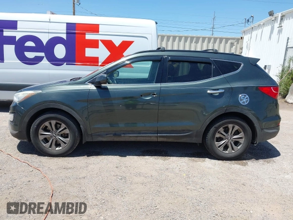 2014 Hyundai Santa Fe with VIN 5XYZUDLB9EG169614, listed as a IAAI auction lot 42208166 with 139,103 mi miles and . Bid and sale history available at DreamBid. Image 14.