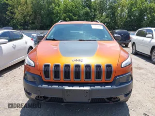 2016 Jeep Cherokee Trailhawk with VIN 1C4PJMBS6GW318035, listed as a IAAI auction lot 42652034 with 187,519 mi miles and . Bid and sale history available at DreamBid. Image 12.
