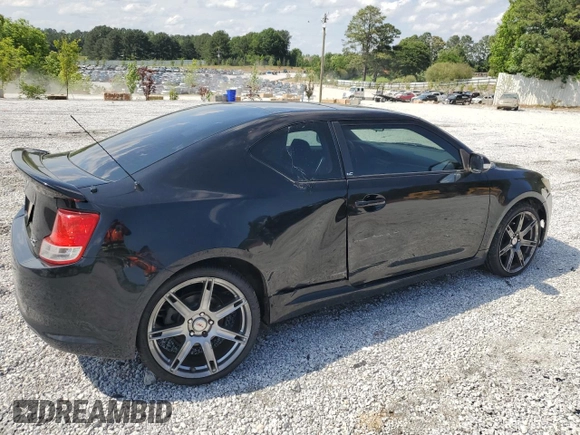 2012 Scion tC z VIN JTKJF5C72C3044845, wystawiony jako Copart lot #57863765 z przebiegiem 220 967 mil mil oraz Szkoda całkowita • Salvage title. Historia ofert i sprzedaży dostępna na DreamBid. Obrazek 3.