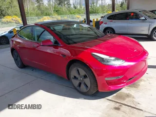 2023 Tesla Model 3 Long Range z VIN 5YJ3E1EB1PF619250, wystawiony jako IAAI lot #42243070 z przebiegiem 17 423 mil mil oraz . Historia ofert i sprzedaży dostępna na DreamBid. Obrazek 1.