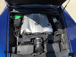 2004 Cadillac XLR z VIN 1G6YV34A045601459, wystawiony jako Copart lot #74522994 z przebiegiem Nie podano mil oraz Szkody całkowita. Historia ofert i sprzedaży dostępna na DreamBid. Obrazek 11.