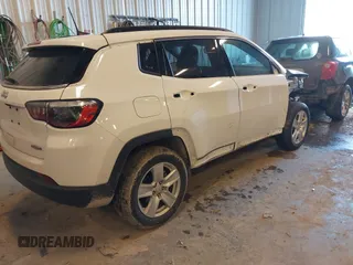 2022 Jeep Compass Latitude with VIN 3C4NJDBB9NT152152, listed as a IAAI auction lot 41377165 with 58,993 mi miles and . Bid and sale history available at DreamBid. Image 4.