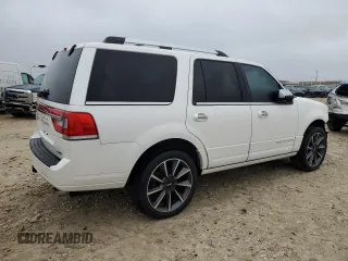 2015 Lincoln Navigator z VIN 5LMJJ2HT0FEJ12667, wystawiony jako Copart lot #45957575 z przebiegiem 138 861 mil mil oraz Szkoda całkowita • Salvage title. Historia ofert i sprzedaży dostępna na DreamBid. Obrazek 3.