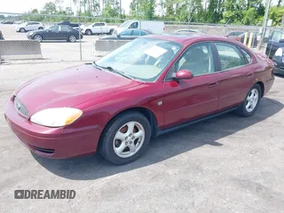 2004 Ford Taurus SES with VIN 1FAFP55S84A141126, listed as a IAAI auction lot 42200307 with 122,195 mi miles and . Bid and sale history available at DreamBid. Image 2.