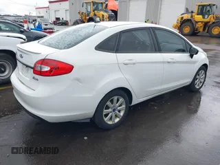 2012 Ford Fiesta SE with VIN 3FADP4BJ8CM102695, listed as a IAAI auction lot 41734833 with 131,779 mi miles. Bid and sale history available at carsss.com. Image 4.