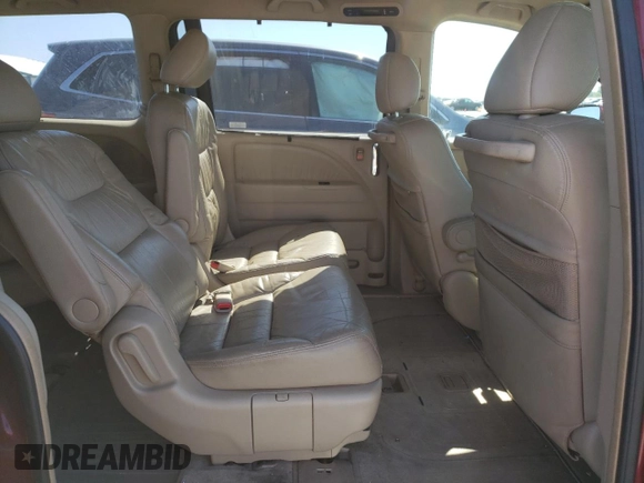 2005 Honda Odyssey Touring z VIN 5FNRL38865B002984, wystawiony jako Copart lot #55175255 z przebiegiem 99 393 mil mil oraz Szkoda całkowita • Salvage title. Historia ofert i sprzedaży dostępna na DreamBid. Obrazek 11.