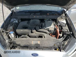 2013 Ford Fusion SE Hybrid z VIN 3FA6P0LU3DR336838, wystawiony jako Copart lot #56205445 z przebiegiem 209 164 mil mil oraz Czysty tytuł • Clean title. Historia ofert i sprzedaży dostępna na DreamBid. Obrazek 11.