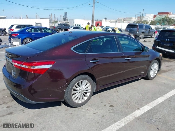 2014 Toyota Avalon Hybrid Limited with VIN 4T1BD1EB1EU018886, listed as a IAAI auction lot 41651673 with 137,890 mi miles. Bid and sale history available at carsss.com. Image 4.