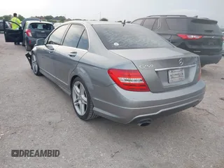 2014 Mercedes-Benz C 250 Sport with VIN WDDGF4HB7EG257087, listed as a IAAI auction lot 42169917 with 165,278 mi miles and . Bid and sale history available at DreamBid. Image 3.