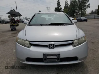 2006 Honda Civic LX z VIN 1HGFA16506L139120, wystawiony jako Copart lot #58874925 z przebiegiem 147 123 mil mil oraz Szkoda całkowita • Salvage title. Historia ofert i sprzedaży dostępna na DreamBid. Obrazek 5.