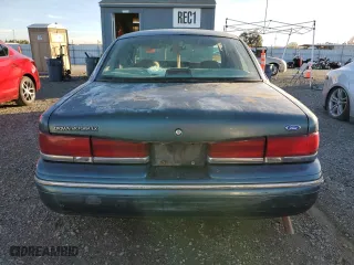 1996 Ford Crown Victoria LX with VIN 2FALP74W0TX129092, listed as a Copart auction lot 80364334 with 135,563 mi miles and Clean Title. Bid and sale history available at carsss.com. Image 6.