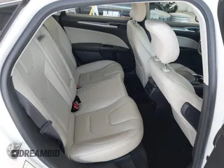 2016 Ford Fusion Titanium with VIN 3FA6P0K96GR390989, listed as a IAAI auction lot 42634275 with 123,559 mi miles and . Bid and sale history available at DreamBid. Image 8.