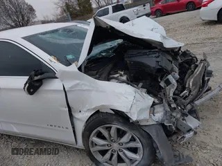 2018 Chevrolet Impala LT z VIN 1G1105S36JU133129, wystawiony jako IAAI lot #41078651 z przebiegiem 100 986 mil mil oraz . Historia ofert i sprzedaży dostępna na DreamBid. Obrazek 16.