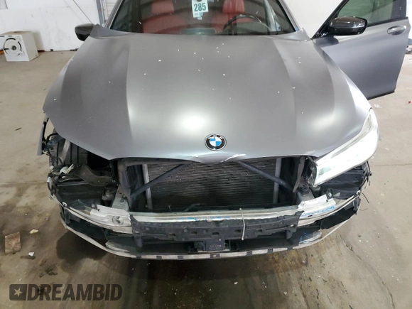2017 BMW 7 Series 750i with VIN WBA7F0C31HGM22359, listed as a Copart auction lot 56306875 with 90,642 mi miles and Salvage title. Bid and sale history available at DreamBid. Image 11.