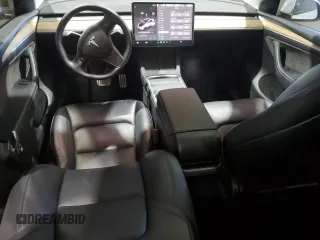 2022 Tesla Model Y Performance with VIN 7SAYGDEF7NF520825, listed as a Copart auction lot 57400245 with 55,437 mi miles and Salvage title. Bid and sale history available at DreamBid. Image 8.