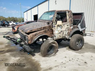 1988 Suzuki Samurai z VIN JS4JC51C6J4271251, wystawiony jako Copart lot #44574795 z przebiegiem 14 542 mil mil oraz Szkody całkowita. Historia ofert i sprzedaży dostępna na DreamBid. Obrazek 1.