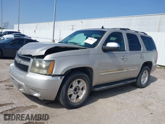 2009 Chevrolet Tahoe 2LT z VIN 1GNEC23379R258434, wystawiony jako IAAI lot #41558672 z przebiegiem 133 646 mil mil oraz . Historia ofert i sprzedaży dostępna na DreamBid. Obrazek 2.